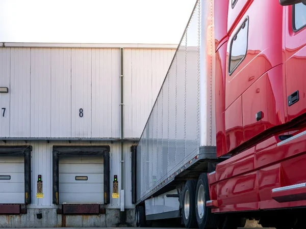 a semi truck being loaded 600x600 crop center